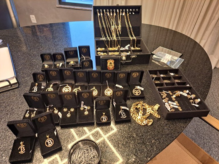 Luxury items with bitcoin image were seized by PF
